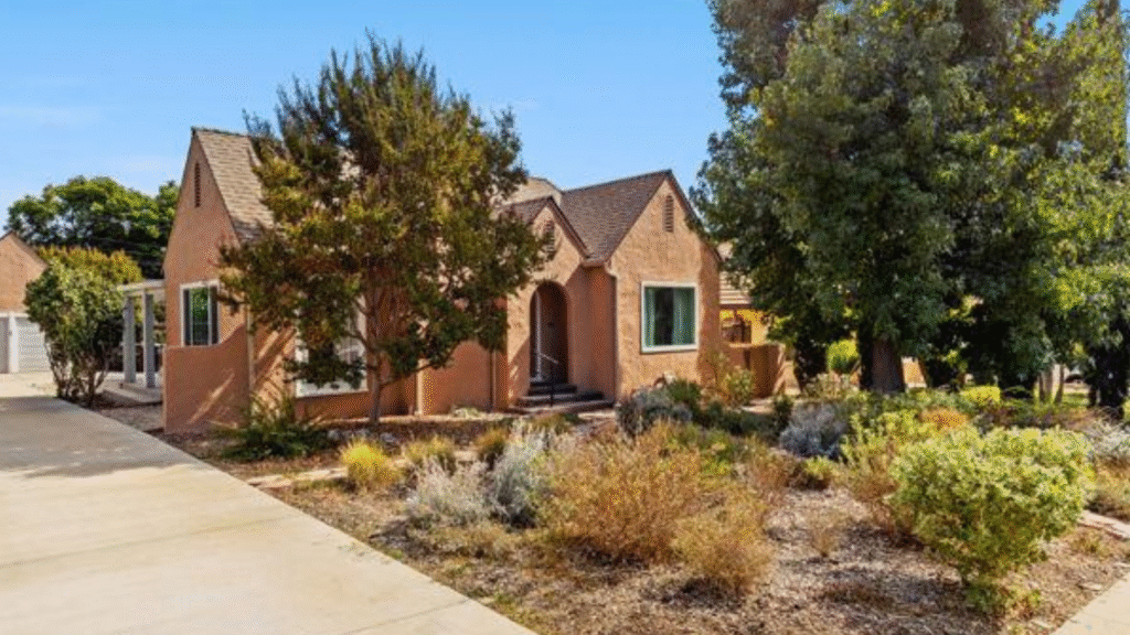 Front exterior of 1418 Cleveland Road in Glendale with Tudor Revival architecture and native landscaping