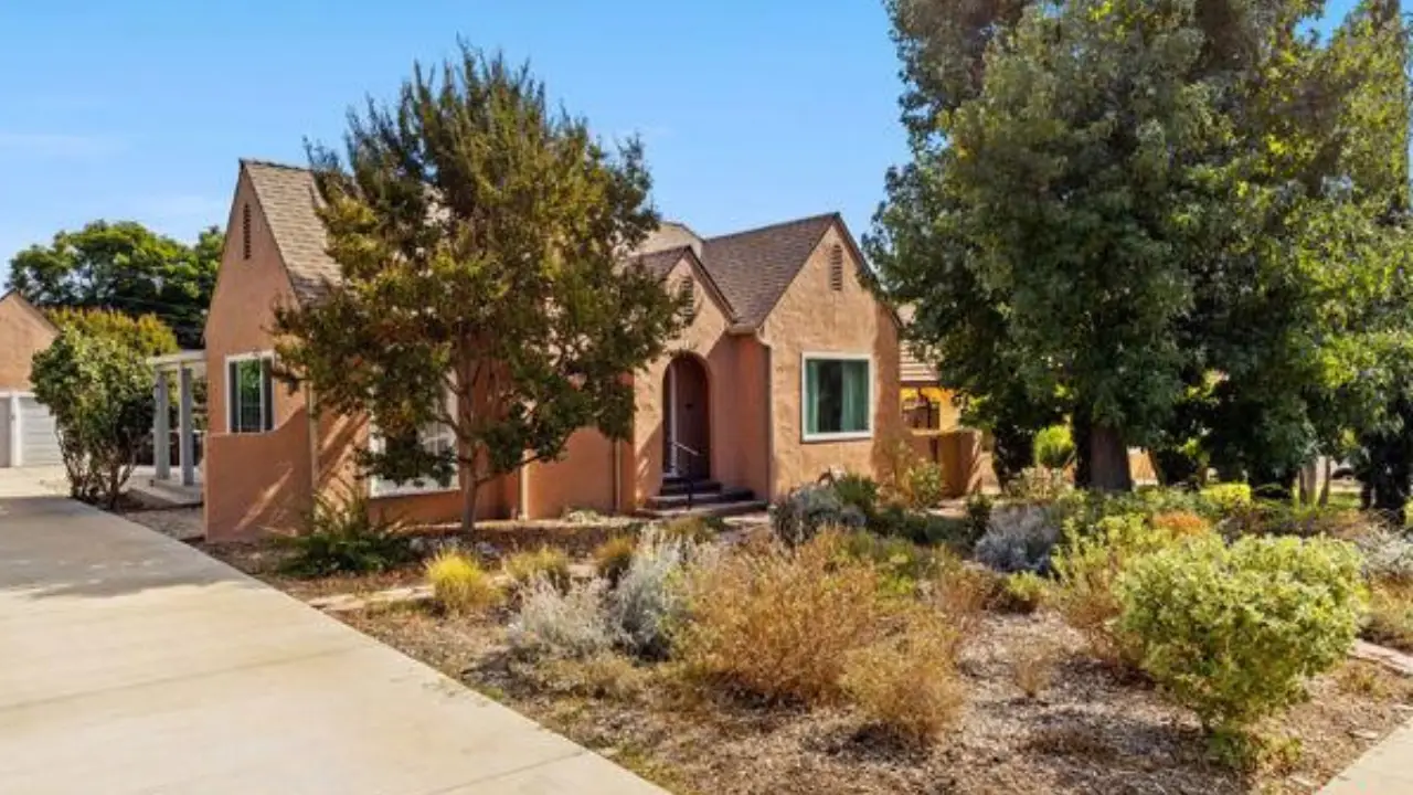 Front exterior of 1418 Cleveland Road in Glendale with Tudor Revival architecture and native landscaping