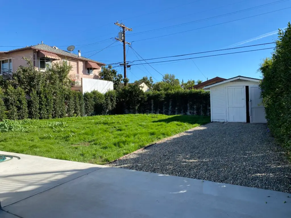 Backyard of 1108 E Harvard Glendale Craftsman Home featuring large flat lot with ADU or studio potential.