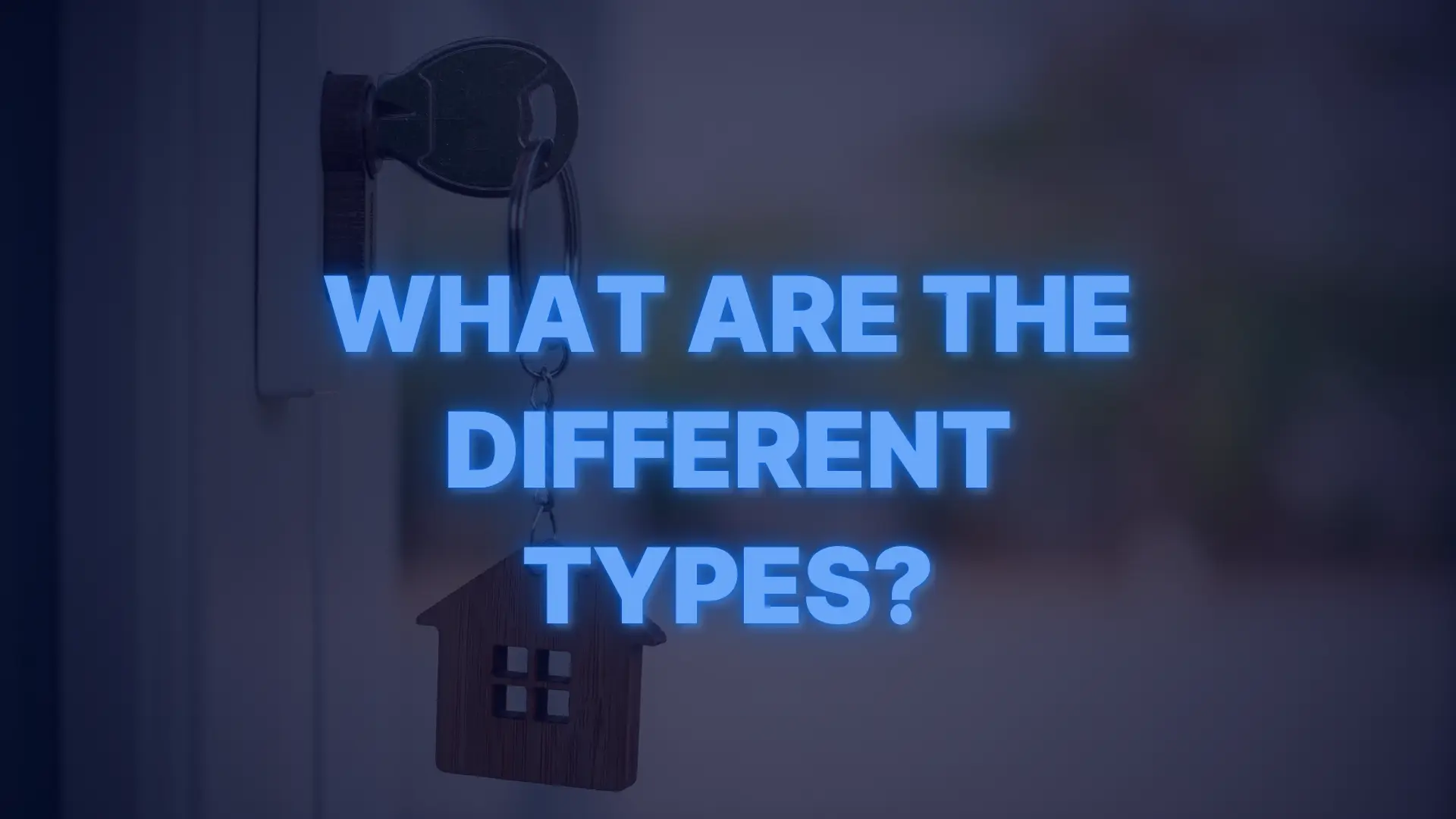 Key with a house-shaped keychain symbolizing different types of FHA home loans.