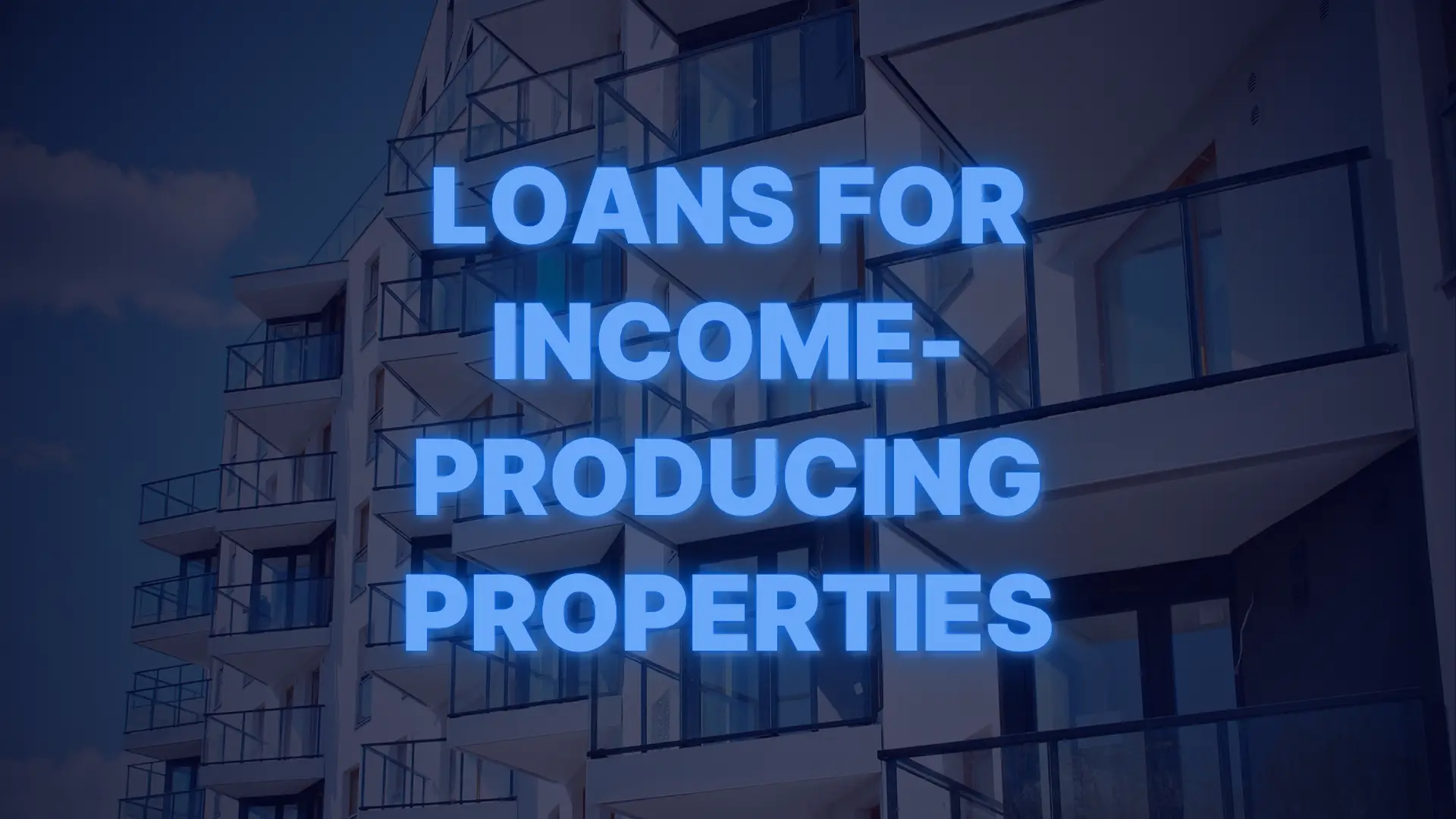 Apartment building with balconies and text advertising loans for income-producing investment properties.