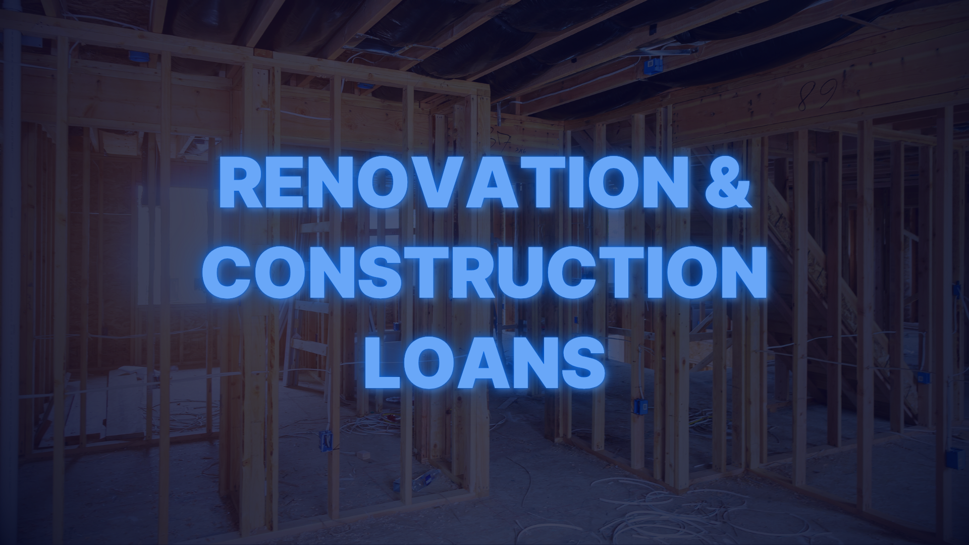Framed home under construction with text promoting renovation and construction loan programs for home improvement.