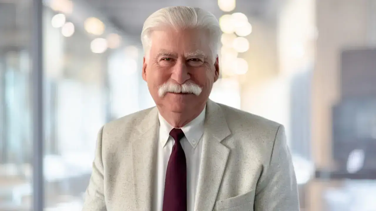 Professional headshot of Steven Abramson in a modern office setting